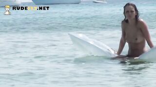 Young nudist with perky titties is joined by a lovers on the beach