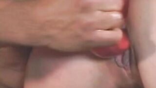 Milf sticks toy into her vagina and a dick into her butt