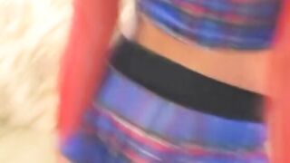 Hottie dark haired into red sleeves uses toy while taking dick into living room