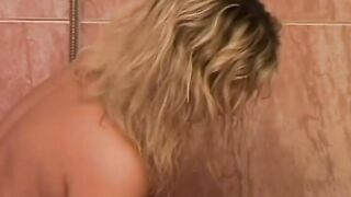 The shower is playtime for babe dark haired and blonde lezzies