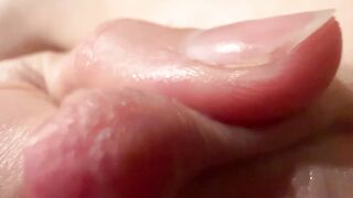 Female breast milk and nipple close up