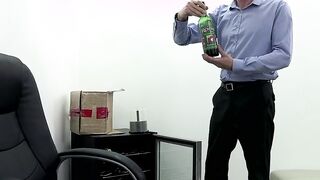 The secretary first fucks a long pvc sex toy and then gets