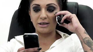 The secretary first fucks a long pvc sex toy and then gets