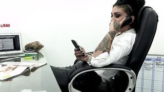 The secretary first fucks a long pvc sex toy and then gets