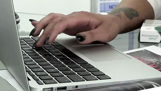 The secretary first fucks a long pvc sex toy and then gets
