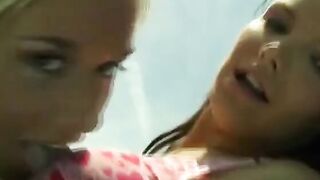 Lesbians have fun with a vibrator at pool party