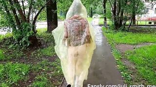 chick inside a raincoat flashing titted and butt on the city streets