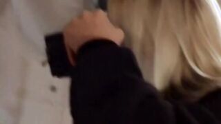 beauty platinum blonde stands over dark haired for dark hair to slide sex toy up her twat