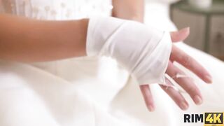 RIM4K. Magnificent dark hair into wedding dress worships groomï¿½s butt