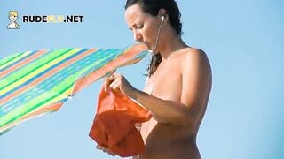 Nudist teenie not shy about showing off naked at the beach