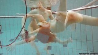 Nudist babes inside the pool underwater stripping
