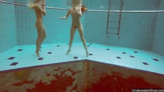 Nudist babes inside the pool underwater stripping