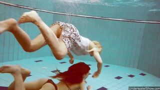 Nudist babes inside the pool underwater stripping