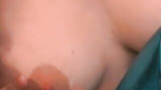 Big Titted Hottie spreads her legs while masturbating by herself until she ejaculates