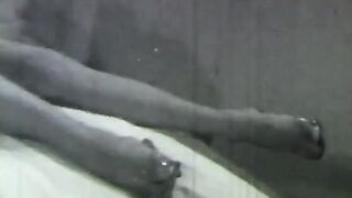 Sexy does a hand stand without a top on