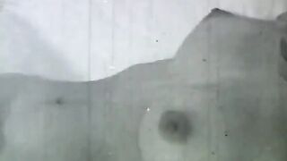 Sexy does a hand stand without a top on