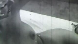 Sexy does a hand stand without a top on