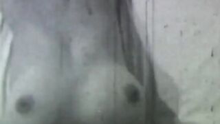 Sexy does a hand stand without a top on