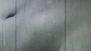 Sexy does a hand stand without a top on