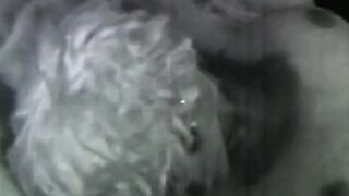 Sexy does a hand stand without a top on