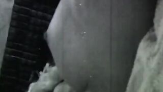 Sexy does a hand stand without a top on