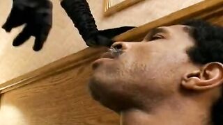 Dominanat old lady Gina Delvaux inside leather outfitmakes african bro to lick her foot before she