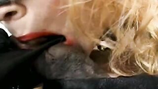 Dominanat old lady Gina Delvaux inside leather outfitmakes african bro to lick her foot before she