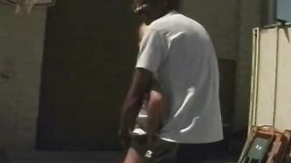 Blonde whore blows and fucks big ebony penis on a rooftop