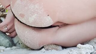 Sluty intense close masturbation on outdoor beach
