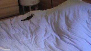 A voluptuous dark haired is having fun with her vibrators
