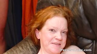 Old German slut with red hair fucked hard in a group