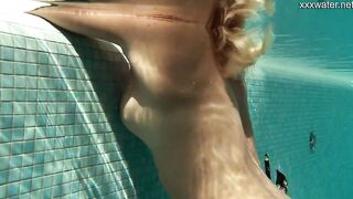 Vyvan Hill swims and gets naked naked into the swimming pool
