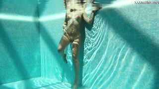 Vyvan Hill swims and gets naked naked into the swimming pool