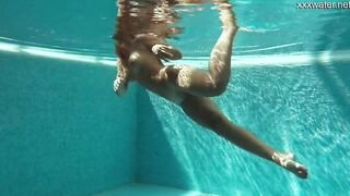 Vyvan Hill swims and gets naked naked into the swimming pool