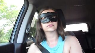 Miss Eva having fun with her boobies and nipples into the vehicle