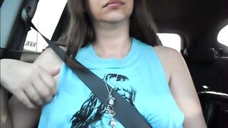 Miss Eva having fun with her boobies and nipples into the vehicle