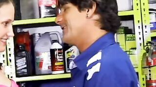 2 service technicians drill stunning dark hair inside the garage