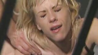 Blonde whore loves having 2 dicks fucking her inside jail