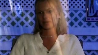 Young blonde smiles as she gets screwed doggy style inside bed