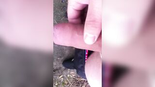 chav peeing and wanking into a field