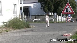 These voluptuous girls don't seem bothered by peeing off their neighbours