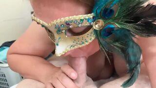 MsKinky slides on her mask to suck on a long penis.
