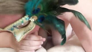 MsKinky slides on her mask to suck on a long penis.