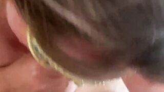 MsKinky slides on her mask to suck on a long penis.
