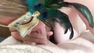 MsKinky slides on her mask to suck on a long penis.