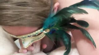 MsKinky slides on her mask to suck on a long penis.