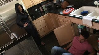 Curvy dark haired cougar gets screwed by a young bro on the sofa