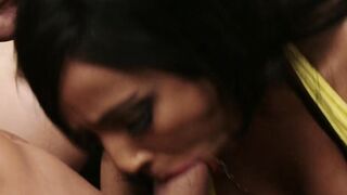 Tanned milf gets spooning on the couch while her friend riding a penis