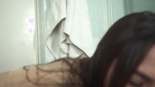 Natalie plays on the shower with her beauty body