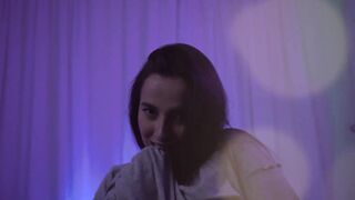 Natalie dancing and taking off her clothes